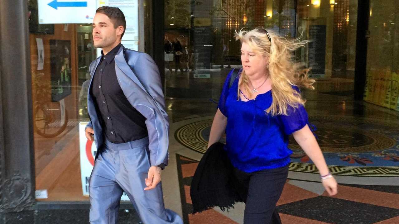 Alleged police bashing victim Corey Barker and his mother Angelique Sines leave the Sydney Downing Centre courts after giving evidence against six officers accused of assaulting him and lying in court. Picture: Chris Calcino