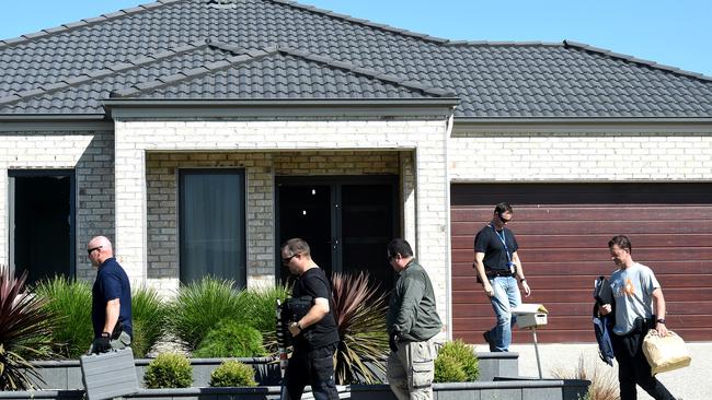 Police remove evidence from a Lyndhurst property during the raids. Picture: Nicole Garmston