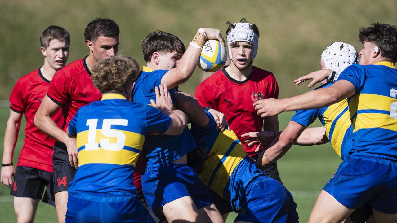 Adam Davis delivers possession back for Toowoomba Grammar School. Picture: Kevin Farmer