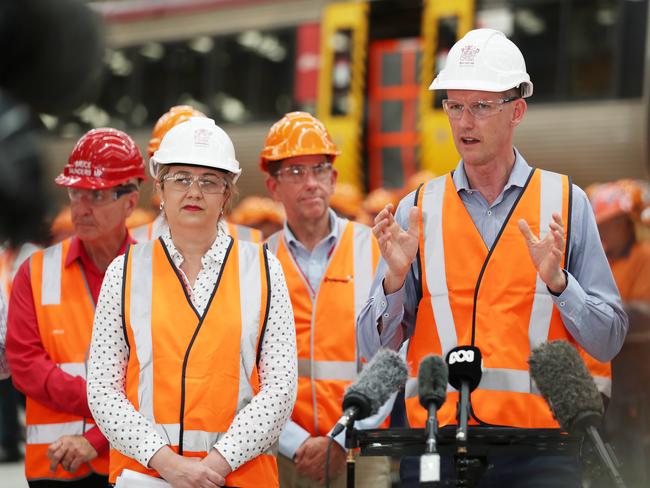 Minister for Transport Mark Bailey with Premier Annastacia Palaszczuk at the Downer Rail Manufacturing facility in Maryborough. Picture: Lachie Millard