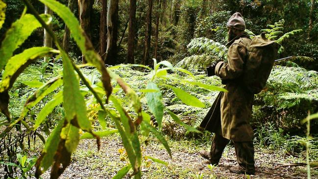 Police cameras rigged up in the bush captured then-fugitive Malcolm Naden.