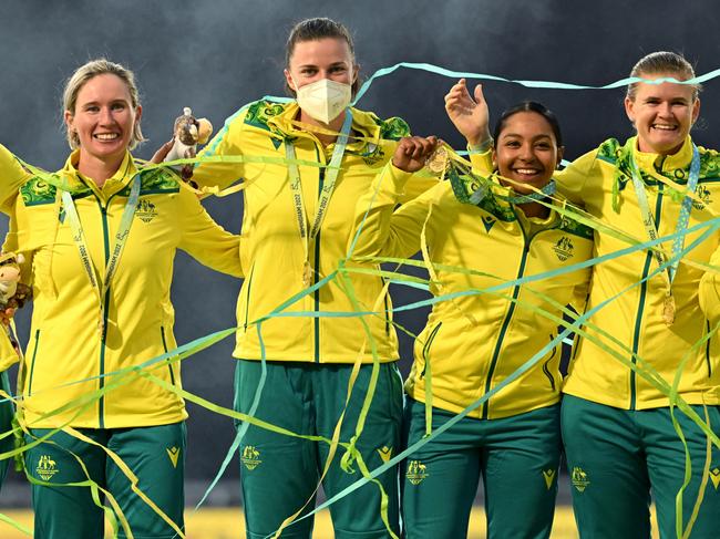 Tahlia McGrath and her teammates celebrate their gold medal win at the Birmingham Commonwealth Games. Picture: AAP Image / Dave Hunt