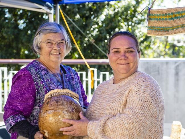 Barbara Walker (left) of Barb's Weaving with customer Karmila Saunders at the NAIDOC arts and craft market at Grand Central, Saturday, July 9, 2022. Picture: Kevin Farmer