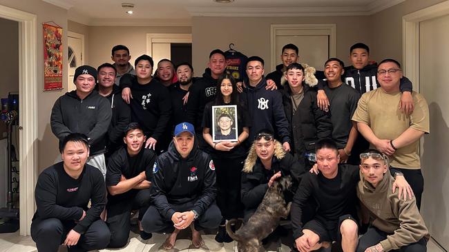 Some of Jonathan Tran’s family and friends at his home after his tragic death in November. Picture: Supplied