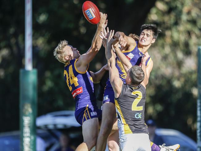 Vermont and Balwyn players fly for the ball. Picture: Valeriu Campan