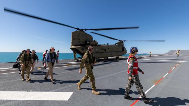 Minister for Defence, Peter Dutton MP, onboard HMAS Canberra, as she sails off the coast Queensland, during Exercise Talisman Sabre 2021.