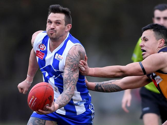 Oak Park’s Justin Colliss is put under pressure against East Keilor this season. Picture: Andy Brownbill