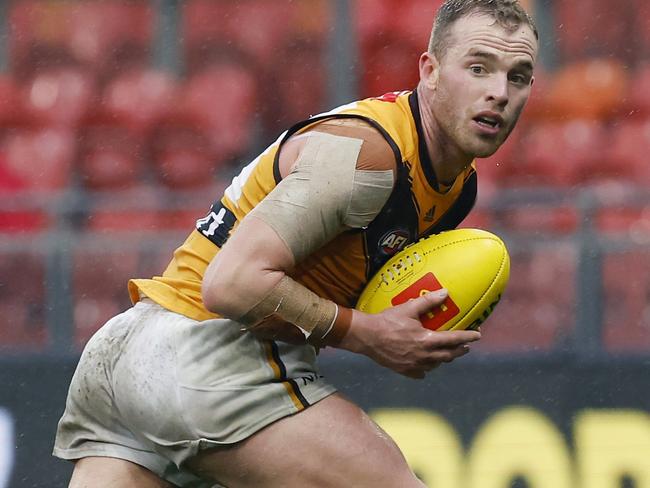 SYDNEY, AUSTRALIA - JULY 03: Tom Mitchell of the Hawks runs with the ball during the round 16 AFL match between the Greater Western Sydney Giants and the Hawthorn Hawks at GIANTS Stadium on July 03, 2022 in Sydney, Australia. (Photo by Mark Evans/Getty Images)