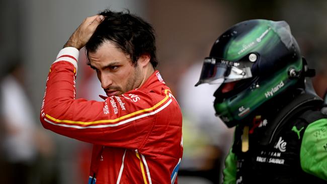 IMOLA, ITALY - MAY 19: Carlos Sainz of Spain driving (55) the Ferrari SF-24 reacts in parc ferme following the F1 Grand Prix of Emilia-Romagna at Autodromo Enzo e Dino Ferrari Circuit on May 19, 2024 in Imola, Italy. (Photo by Rudy Carezzevoli/Getty Images)