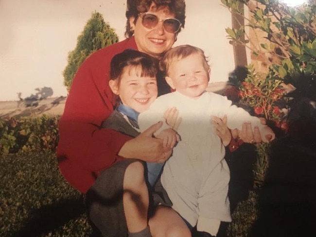 A young Lisa with her brother, Vincent, and their nonna, Dorothy.