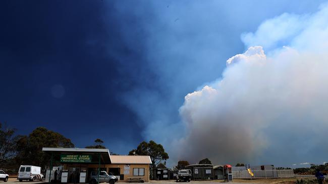 Smoke intensifies behind the Great Lakes Store. Picture: LUKE BOWDEN