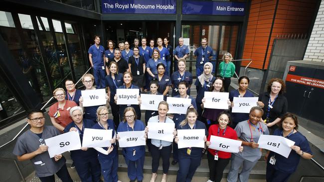 Royal Melbourne Hospital staff urging people to stay at home. Picture: David Caird