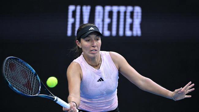 USA's Jessica Pegula hits a return against Czech Republic's Barbora Krejcikova during their women's singles match on day seven of the Australian Open tennis tournament in Melbourne on January 22, 2023. (Photo by WILLIAM WEST / AFP) / -- IMAGE RESTRICTED TO EDITORIAL USE - STRICTLY NO COMMERCIAL USE --