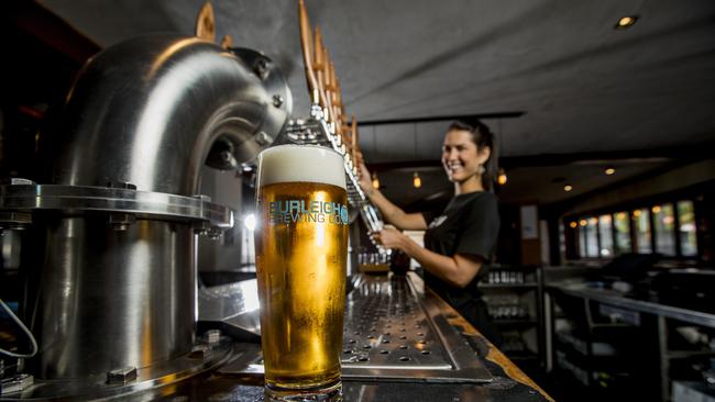 Dannielle Abrantes from Burleigh Brewing Company celebrating the tax breaks for small brewers. Picture: Jerad Williams