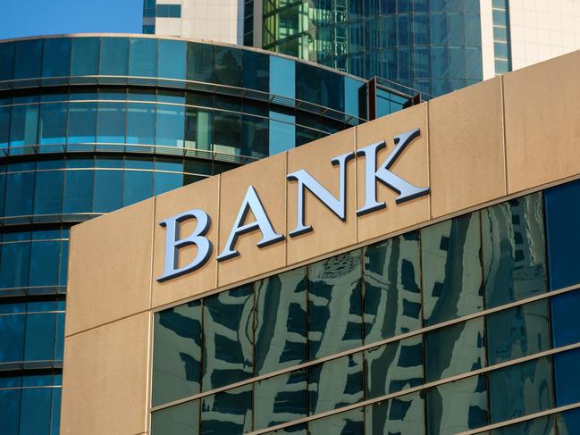 Bank sign on glass wall of business center