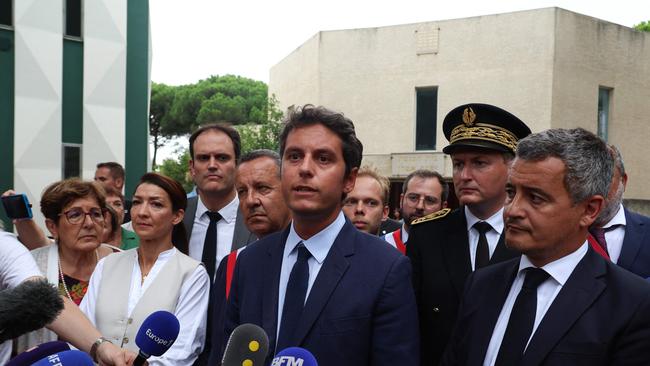 France's Prime Minister, Gabriel Attal and the Minister for the Interior and Overseas, Gerald Darmanin, at the site. AFP