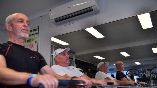 FUNDRAISING: John Ward and Adam Crawley are rowing at Invigorate Health Club in Mudjimba to raise funds for The Smith Family. Photo: John McCutcheon