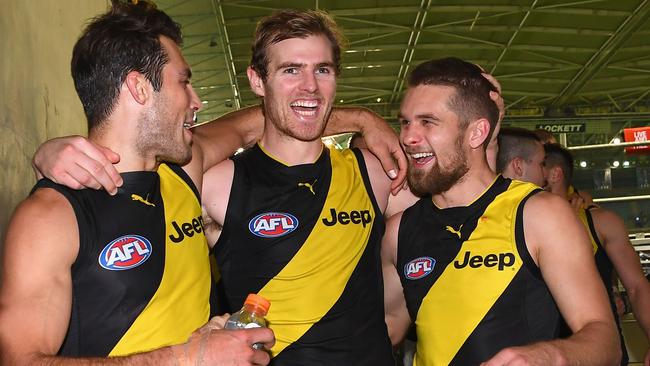 Alex Rance, David Astbury and Dan Butler celebrate Richmond’s win over North Melbourne. Picture: Getty Images