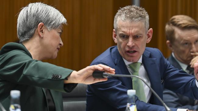 Foreign Minister Penny Wong confers with DFAT deputy secretary Craig MacLachlan during Senate estimates. Picture: NCA NewsWire / Martin Ollman