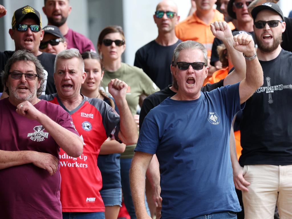 Former CFMEU state secretary Michael Ravbar, in blue top on the right, and Former CFMEU assistant secretary Kane Lowth, in maroon on the left, at Tuesday’s rally. Picture: Liam Kidston