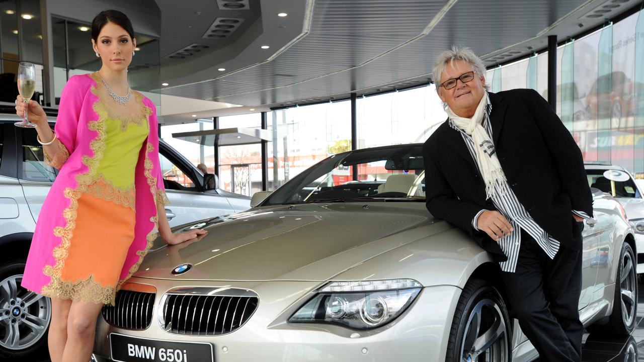 Harry with Finesse model Natalie, pictured with a BMW 650i motor car at Adelaide BMW.