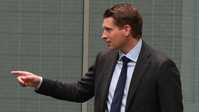 Andrew Hastie points the way to his local butcher. Picture: Kym Smith