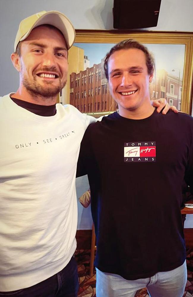 Aspiring professional surfer Logan Steinwede (right) with stepfather NRL star Kieran Foran. Photo: Supplied.