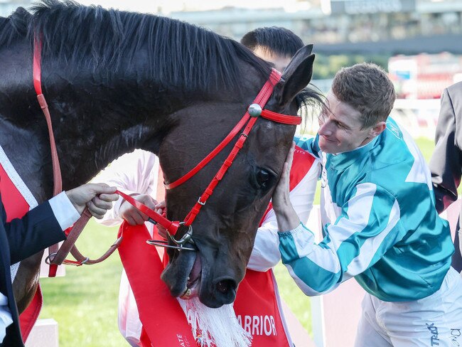 James McDonald and Romantic Warrior (IRE) with connections after winning the Ladbrokes Cox Plate at Moonee Valley Racecourse on October 28, 2023 in Moonee Ponds, Australia. (Photo by George Sal/Racing Photos via Getty Images)