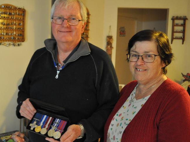 Michael Pratt and wife Dianne with his George Cross for bravery.