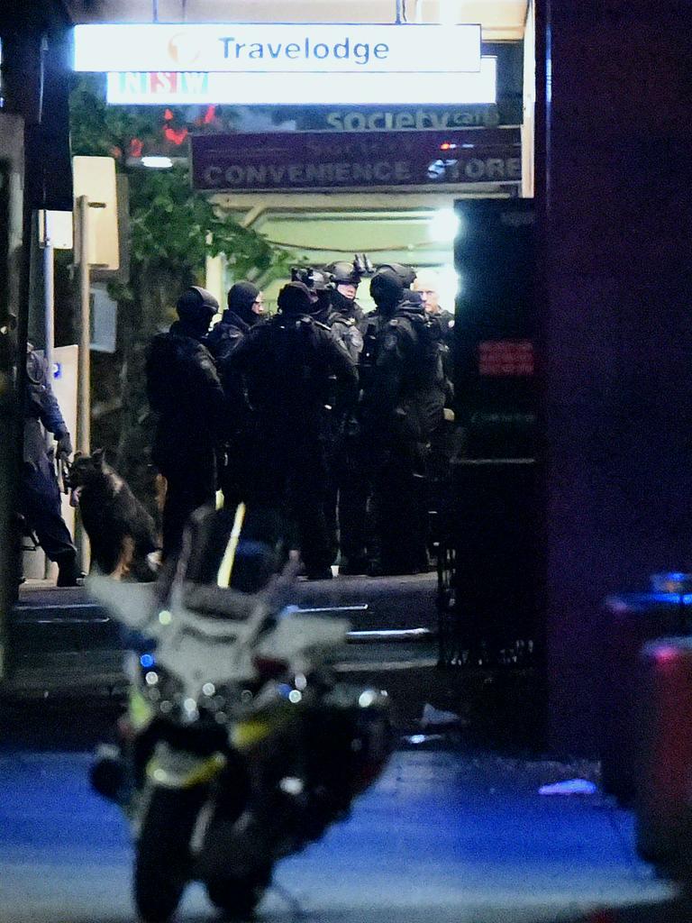 Armed police outside the Lindt cafe. Picture: Saeed Khan ( AFP)