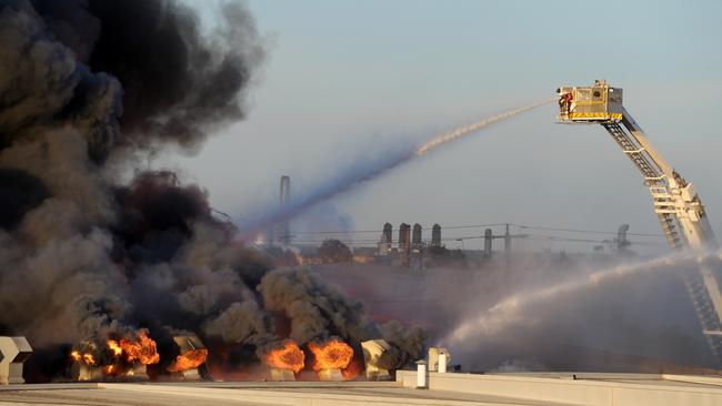 An out of control fire rages through factories around Thornycroft Street Campbellfield. Picture: Andrew Henshaw