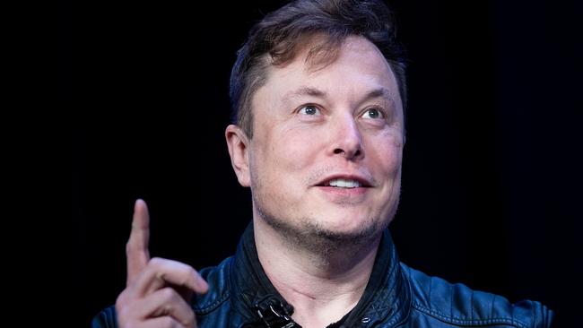 (FILES) In this file photo taken on March 09, 2020 Elon Musk, founder of SpaceX, speaks during the Satellite 2020 at the Washington Convention Center in Washington, DC. - The US tech sector is likely to be hit hard by President Donald Trump's decision to extend a freeze on most immigrant visas, with critics saying the move could undermine American innovation and leadership. (Photo by Brendan Smialowski / AFP)