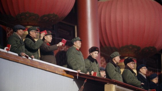 (L-R) Chen Yun, Kang Sheng, Zhou Enlai, Chairman Mao Zedong, Lin Biao, Liu Shaoqi and Chen Boda interview the Red Guards in 1966 in Beijing.