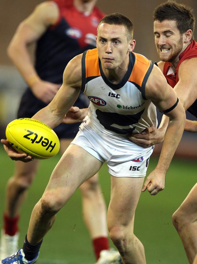 Tom Scully in action for the Giants against Melbourne. 