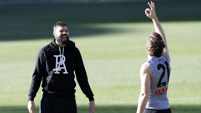 Port Adelaide ruckman Paddy Ryder, left, shares a laugh with Jared Polec at Power training yesterday. Picture: Sarah Reed