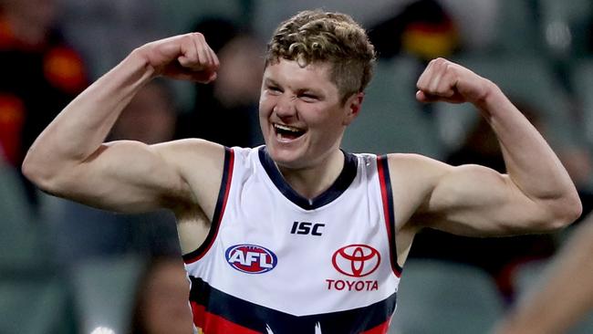 ADELAIDE, AUSTRALIA - SEPTEMBER 01: Harry Schoenberg of the Crows celebrates a goal during the 2020 AFL Round 15 match between the Hawthorn Hawks and the Adelaide Crows at Adelaide Oval on September 1, 2020 in Adelaide, Australia. (Photo by James Elsby/AFL Photos via Getty Images)