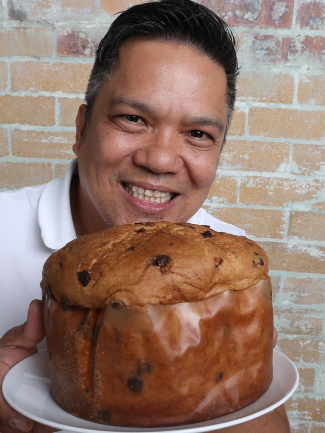 Valentino Acuzar with the Aldi Salted Caramel and Chocolate Chip Panettone. Picture: Liam Kidston