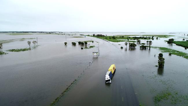 Drone images of flooding at Thompson's Creek on the Bruce Highway at Goorganga Plains looking north. Photos: Robert Murolo