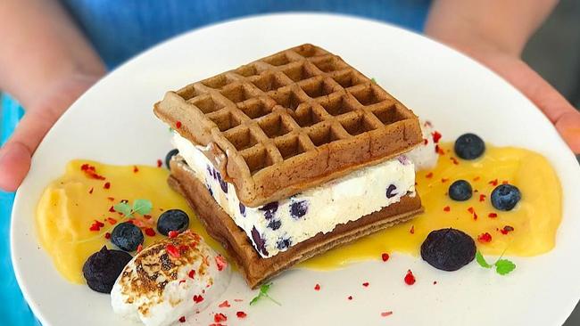 This Maxijohn — lemon and blueberry semifreddo sandwiched between two gingerbread waffles, finished with lemon curd and blueberry gel — might just be the best thing that ever happened to brunch. Down the Rabbit Hole Cafe: we salute you.