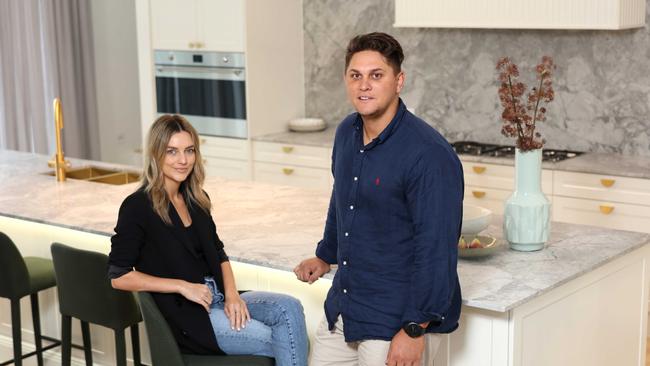 Nick Bidois and partner Mikaela Walker at the home they are taking to auction at 43 Pringle St, Ascot. Picture: Peter Wallis.