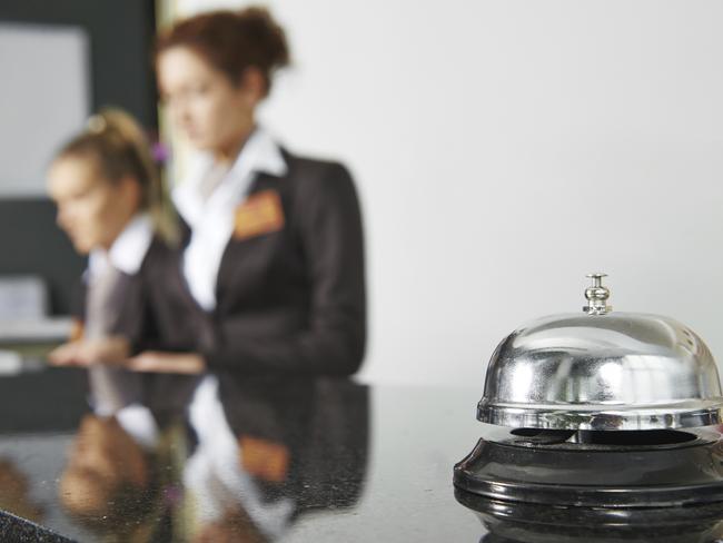 Modern luxury hotel reception counter desk with bell