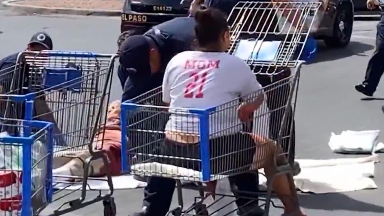 El Paso victims were seen being carried out in shopping trolleys. Picture: WKRG