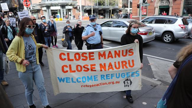 Refugee Action Coalition protesters outside Sydney Town Hall. Picture: Tim Hunter