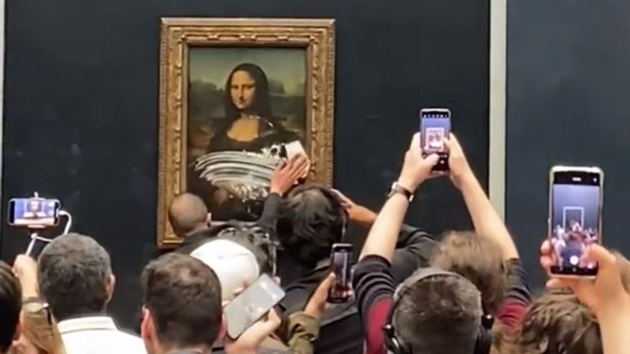 It looked like the Mona Lisa’s body had been directly hit by the creamy attack. Picture: Twitter