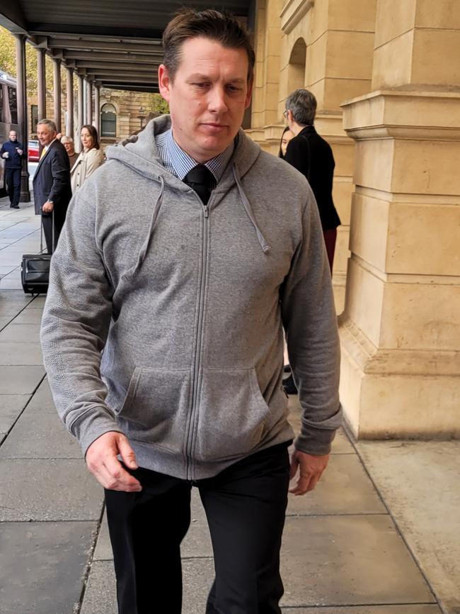 Brevet Sergeant Andrew Smith leaves the District Court on Wednesday morning. Picture: Jordanna Schriever