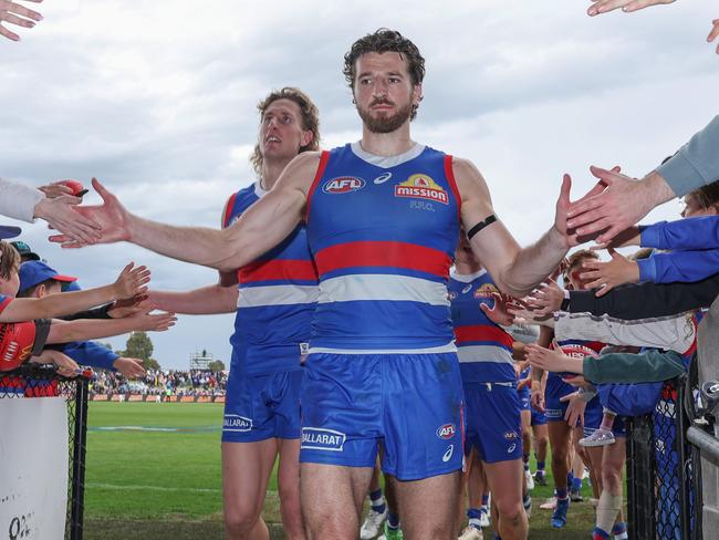 Marcus Bontempelli leads off the Bulldogs after their impressive win over the Giants. Picture: Daniel Pockett/Getty Images