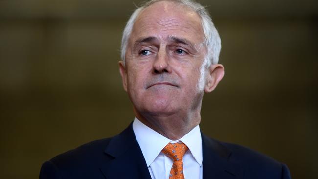 Malcolm Turnbull has said the AFP raids have nothing to do with him and his party. Picture: Lukas Coch/AAP