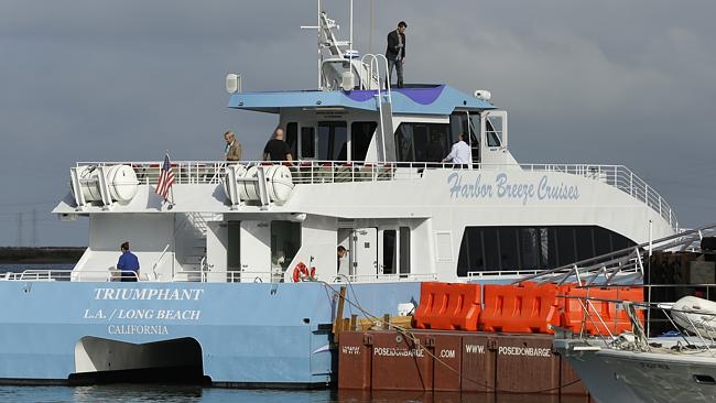 Commuters board the "Triumphant", a catamaran serving as a ferry for Google employees. Pic...