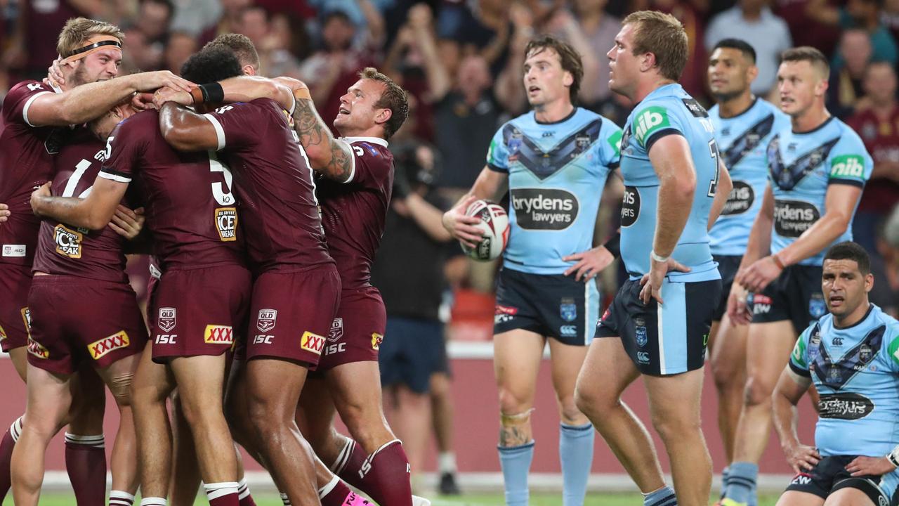 Queensland celebrate a try to Harry Grant. Picture: Peter Wallis