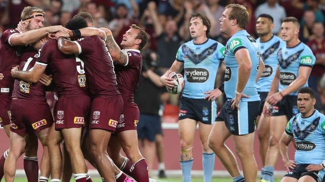 Queensland celebrate a try to Harry Grant. Picture: Peter Wallis